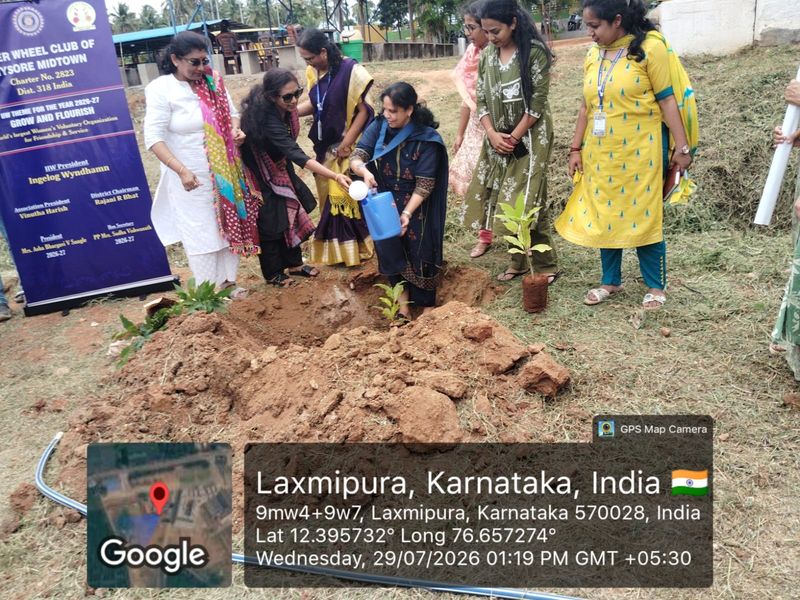 The photograph indicates a tree plantation programme organised by the Inner Wheel Club of Mysore Midtown at MRIT College Premises.
